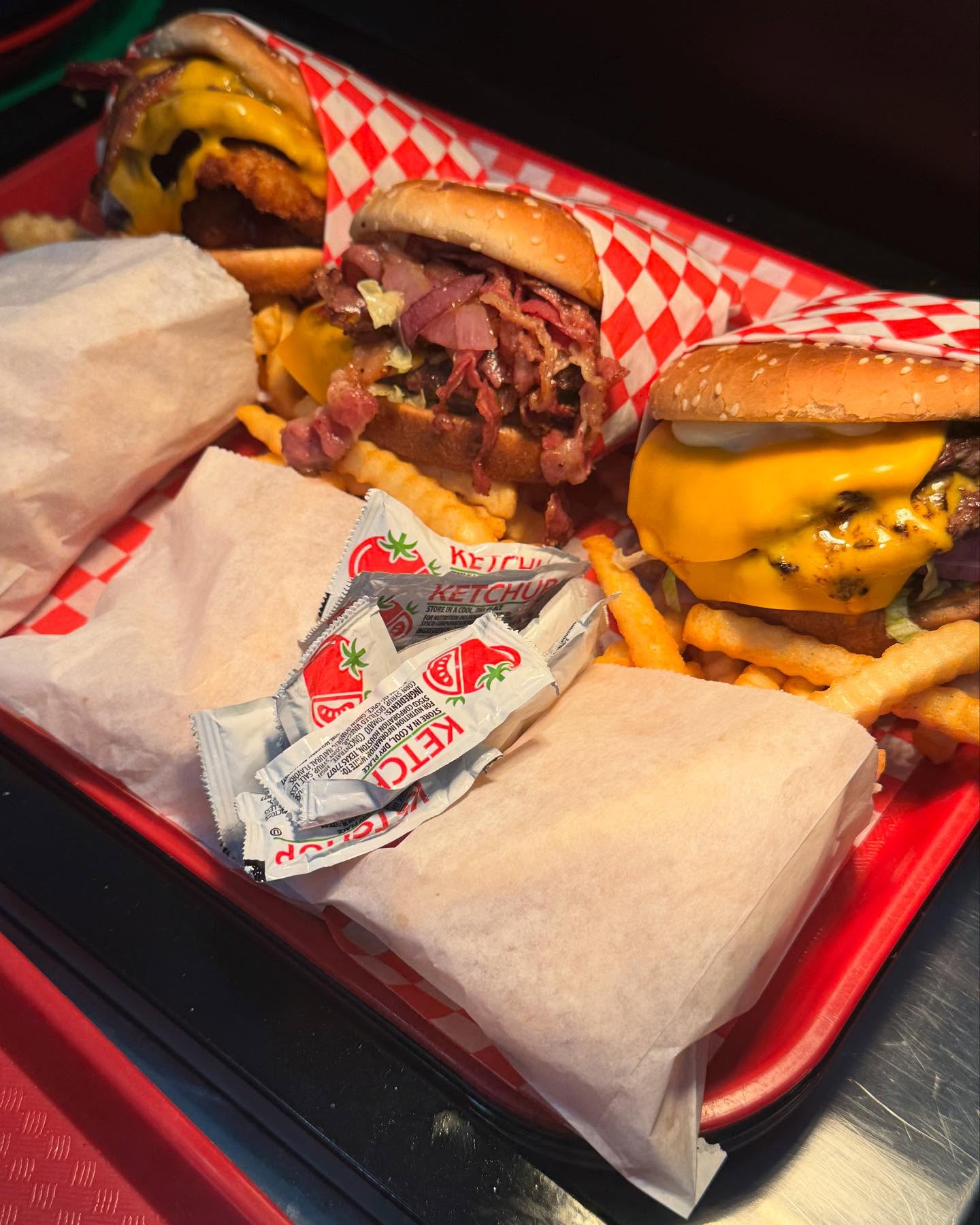 Open-face special burger combo with pastrami and fries