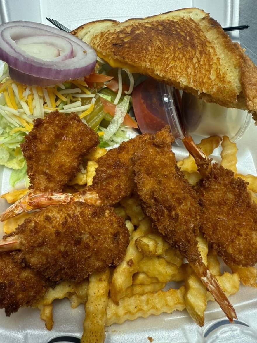 Shrimp basket combo with crinkle fries on a red tray